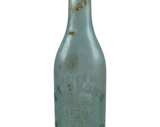 272 - C.T. Brown Danville, VA Bottle 9" (Description): Antique glass bottle from C.T. Brown of Danville, Virginia. The bottle features embossed lettering and trademark design on the front. Measures 9 inches tall.