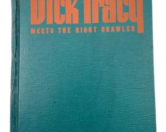 872 - 1945 Dick Tracy Meets the Night Crawler Book (Description): Dick Tracy Meets the Night Crawler, copyright 1945. This vintage book features the iconic detective character Dick Tracy in his encounter with the Night Crawler villain.