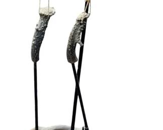 1084 - Deer Antlers Fireplace Set 35" (Description): A decorative fireplace tool set crafted from natural deer antlers. The set features antler handles and an antler base, combining rustic aesthetics with functional design. Measures 35 inches in height.