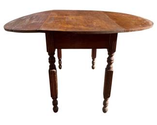 1021 - Vintage Drop Side Table 30"x50"x38" (Description): Featuring turned and reeded legs. The table measures 30 inches by 50 inches by 38 inches.
