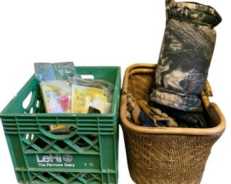 667 - Group Lot of Gloves & Deer Items (Description): A group lot of gloves and deer-related items. This assortment includes various gloves and accessories suitable for hunting or outdoor activities. Includes containers shown.