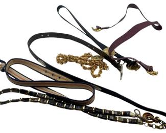 792 - Group Lot of Vintage Belts (Description): A group lot of vintage belts featuring various styles, materials, and designs. The collection includes leather belts, chain belts, and woven fabric belts with assorted hardware and buckle styles.