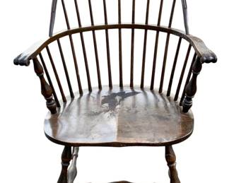 1081 - Windsor Back Chair (Broken Arm) 37"x26"x24" (Description): Windsor back chair with a broken arm. This classic spindle-back chair features turned legs and stretchers with a shaped solid wood seat. The chair shows wear consistent with age and use. Measures 37 inches high by 26 inches wide by 24 inches deep.