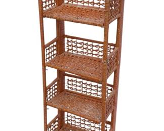 1068 - 4 Tier Wicker Shelf 45"x15"x10" (Description): Four tier wicker shelf featuring woven shelving and decorative circular accents at the top. Measures 45 inches tall by 15 inches wide by 10 inches deep.