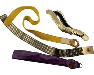 793 - Group Lot of Vintage Belts (Description): A group lot of vintage belts featuring various styles and materials. The collection includes multiple decorative belts showcasing different design aesthetics from the vintage era.