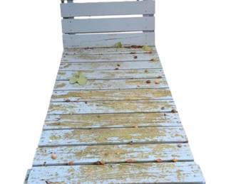 1125 - Wood Chaise Lounge Painted 37"x66"x26" (Description): Painted wood chaise lounge with slatted construction. Measures 37 inches wide by 66 inches long by 26 inches high.