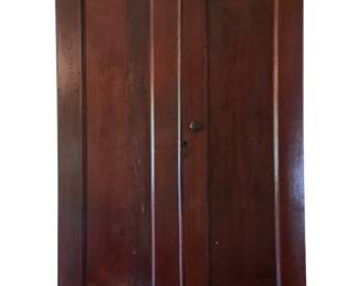 753 - Vintage Empire Double Door Wardrobe (Description): Wooden wardrobe featuring two paneled doors with a central knob and keyhole. The piece has a molded crown and stands on bracket feet. Measures 82 inches tall by 52 inches wide by 20 inches deep.