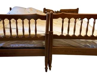 1141 - Pair Twin Beds 41"x80"x8" (Description): A two-piece set of twin beds featuring wooden construction with turned spindle details on the headboards and footboards. The beds have a traditional style with decorative carved top rails and turned finial posts. Measurements: 41" x 80" x 8".