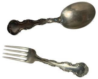 2014 - Gorham Sterling Child's Spoon & Fork 46g (Description): Gorham sterling silver spoon and fork set. Each piece measures 4.5 inches in length. The handles feature ornate decorative detailing characteristic of Gorham's fine silver craftsmanship.