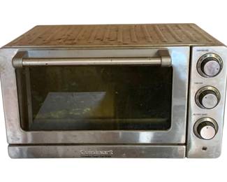 1036 - Cuisinart Convection Toaster Oven Broiler (Description): Cuisinart convection toaster oven broiler in stainless steel finish. Features temperature, function, and toast shade control dials. Includes interior baking tray. Measures 10 inches by 16.5 inches by 14 inches. Used as-is electric/electronic/mechanical item. No guarantee all components present, untested if not otherwise stated.