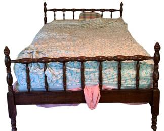 756 - Vintage Full Size Bed w/ Bedding (Description): Queen size wooden bed with turned spindle headboard and footboard, featuring decorative finials on all four corner posts. The bed comes complete with bedding. Measures 45 inches tall by 83 inches long by 56 inches wide.