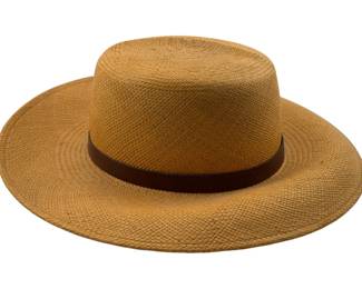 702 - Talbots Straw Hat (Description): A Talbots hat featuring woven straw construction with a brown leather band accent. The hat has a wide brim and flat-topped crown in a classic style.