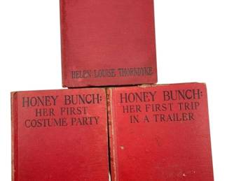 869 - Group Lot of 3 Honey Bunch Books (Description): A group lot of three Honey Bunch books by Helen Louise Thorndyke, published by Grosset & Dunlap. The vintage volumes feature red cloth bindings with black lettering on the spines. Titles in this collection include works from the popular children's series.