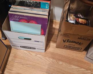 2 boxes of albums 25.00