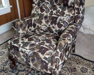 Upholstered Recliner Chair With Cigar And Book Motif And Claw Feet