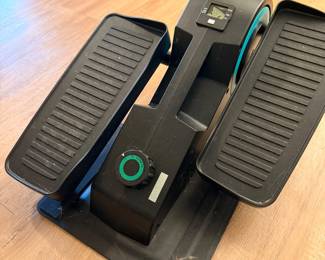 Compact Exercise Pedal Machine – Portable seated exercise equipment.