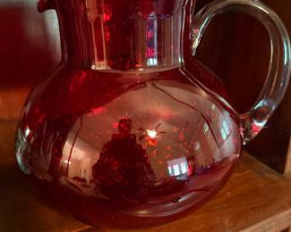 Ruby-Red Glass Pitcher – Attractive vintage-style red glass pitcher with clear handle.