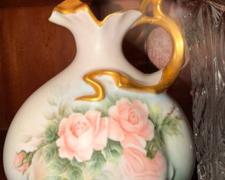 Hand-Painted Porcelain Floral Pitcher – Elegant porcelain pitcher with pink roses and gold accents.