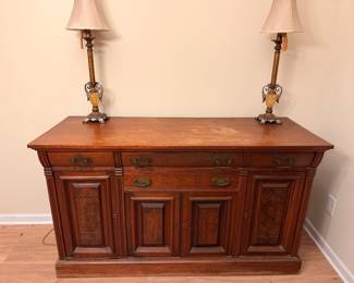 Antique-Style Wooden Sideboard – Large wooden buffet or sideboard with decorative brass-tone hardware and generous storage.