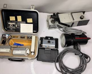 Lot 56: Lot of Vintage Photography Equipment including Polaroid Automatic 100 Land Camera Kit, Tri-Lite 2000 Optical Spotlight/Snoot, LH2400 Lamphead