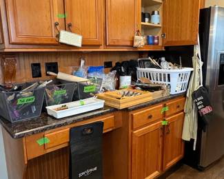 Assorted Kitchen Utensils and Flatware Collection