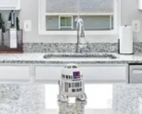 R2D2 statue, kitchen knives (not shown - pots, pans, dishes, glasses)