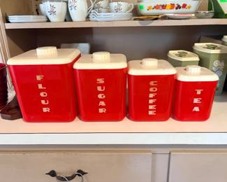 complete 4-piece set of 1950s Lustro-Ware red and white plastic nesting kitchen canisters (Flour, Sugar, Coffee, Tea)