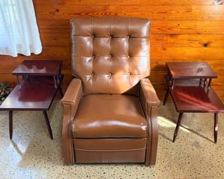 vintage brown button-tufted vinyl or Naugahyde push-back or motion recliner chair