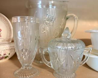 vintage clear glassware in the Iris & Herringbone pattern made by the Jeannette Glass Company