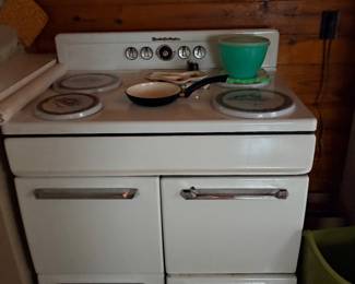 vintage white electric range and oven from the mid-20th century