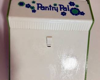 vintage Pantry Pal recipe box from the 1960s or 1970s, featuring a retro white, green, and blue "flower power" design