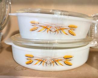 vintage Anchor Hocking Fire-King milk glass casserole dishes in the Harvest Wheat (or Golden Wheat) pattern from the 1950s–1960s