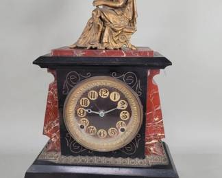 Lot 485 Vintage iron figural mantel clock