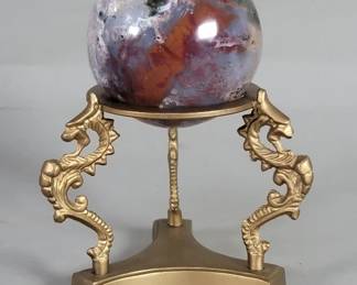 Lot 500 Polished agate sphere resting on brass stand