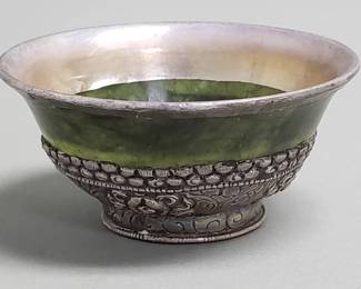 Lot 552 Vintage silver mounted and spinach jade tea cup