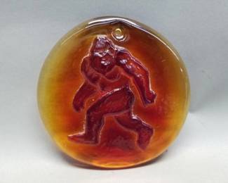 Lot 524 Blenko glass medallion with ape