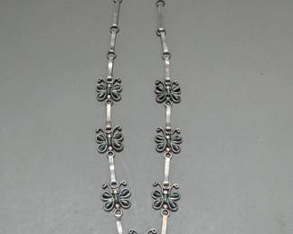 143 Lot 107 Vintage Native Americanstyle silver and turquoise butterfly necklace