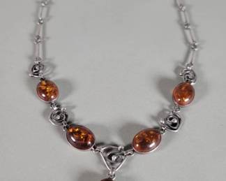 Lot 517 Vintage sterling silver and amber necklace