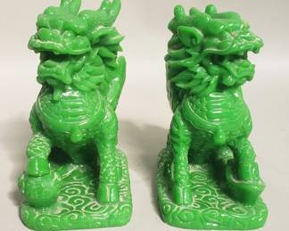 Lot 384 Pair of Asian composite foo dogs figurines