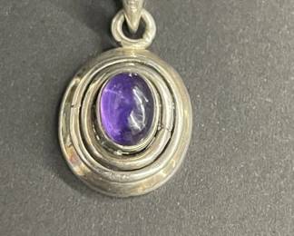 Lot 601h Sterling silver and amethyst pendant