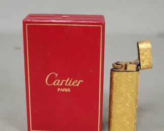 079 Lot 346 Vintage goldplated Cartier pocket lighter with presentation box