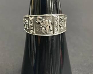 Lot 550h Sterling silver wide band ring with good luck
