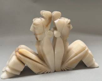 Lot 76 Pair of carved onyx sculptures