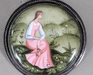 Lot 482 Silver and figurative enamel brooch