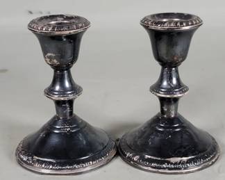 Lot 506 Sterling silver weighted candlesticks
