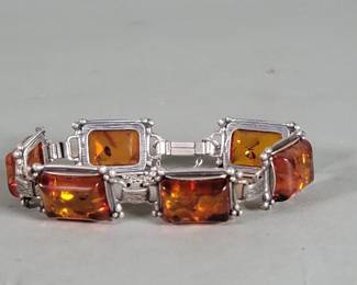 Lot 516 Vintage sterling silver and amber bracelet