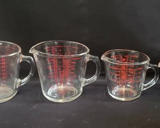 Lot 598 Group of vintage Pyrex measuring cups
