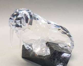 196 Lot 146 Swarovski crystal walrus on marble base