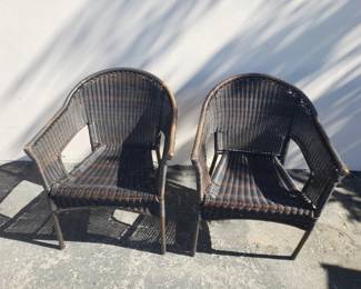 Lot 424 Pair of wicker outdoor patio chairs