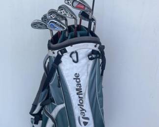 052 Lot 340h Mixed golf clubs, including PING irons, with TaylorMade bag